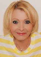 Нелли Джини